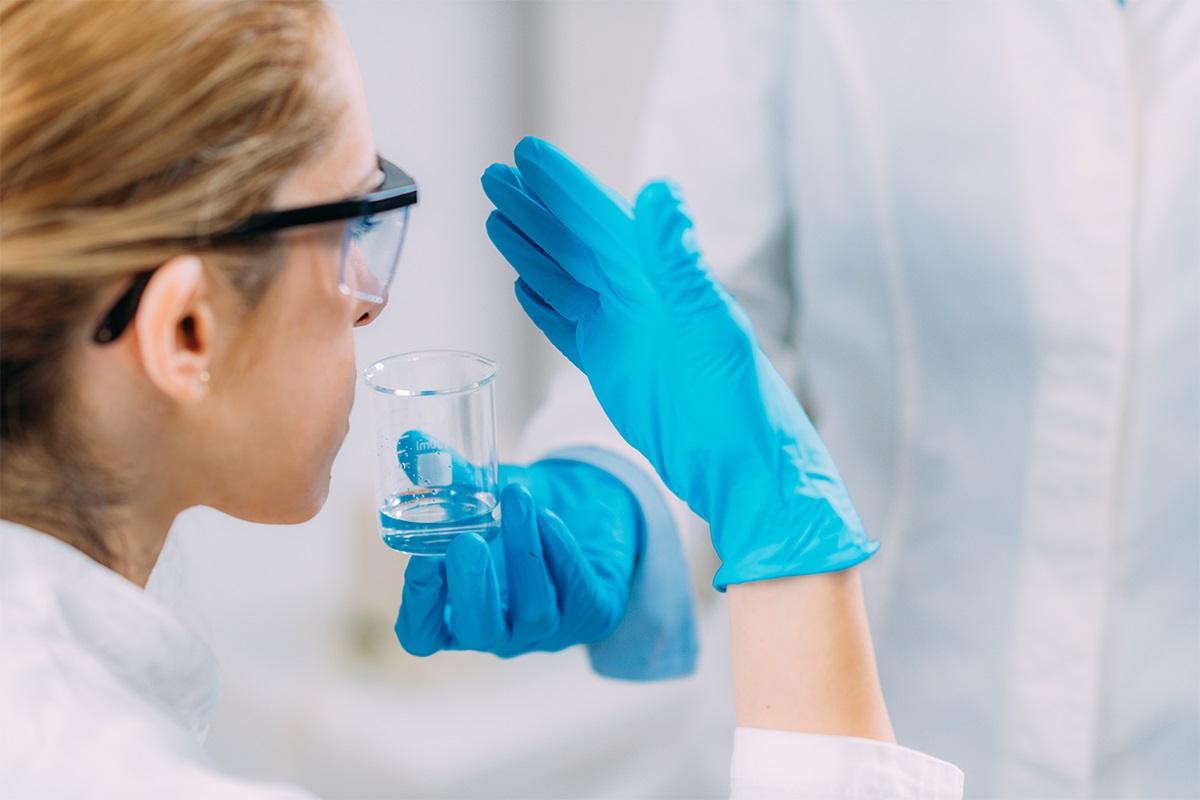 scientists examining smell substance olfaction laboratory test